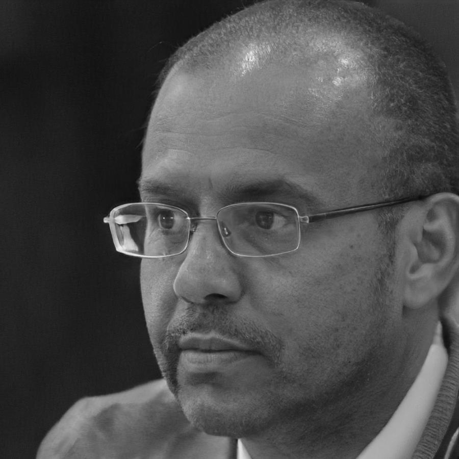 Professional headshot of male team member