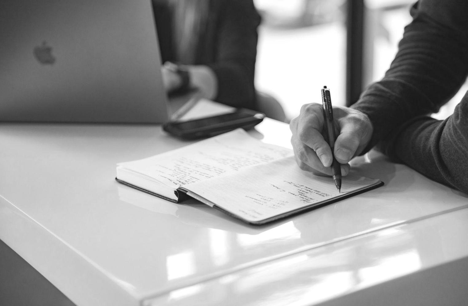 Event professionals collaborating on investment planning strategies in a modern learning environment